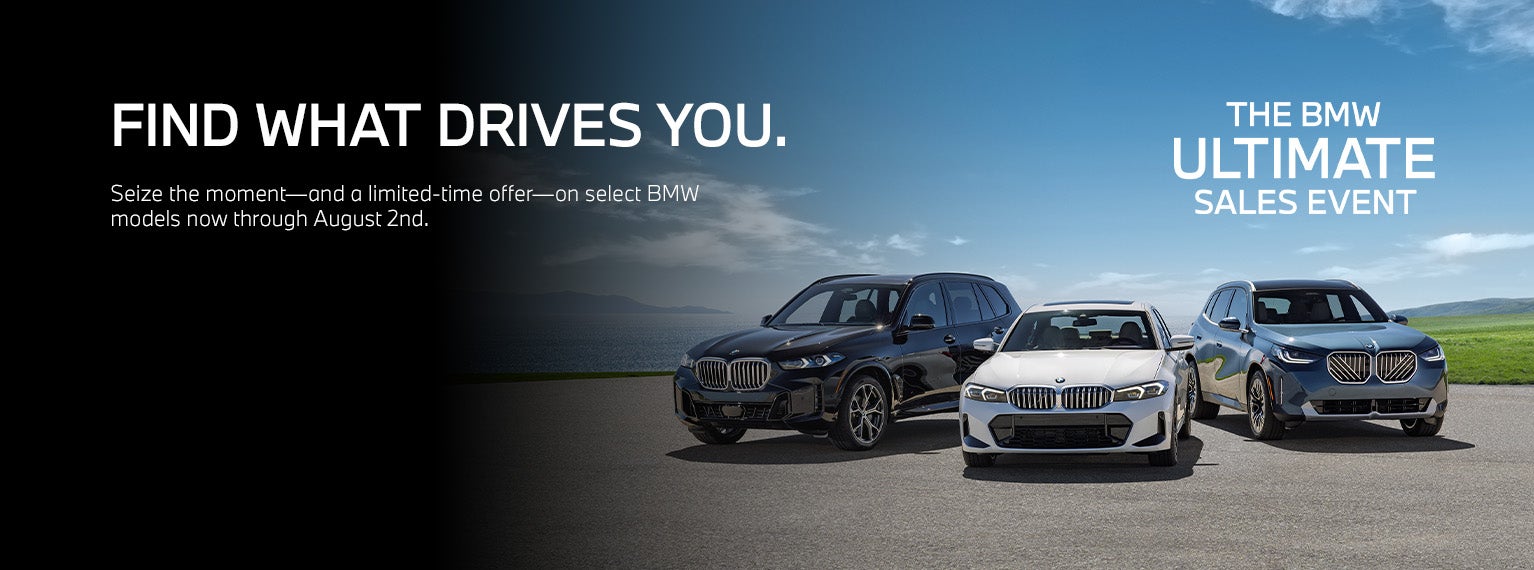 BMW X5, 330i, and X3 parked near seaside.
